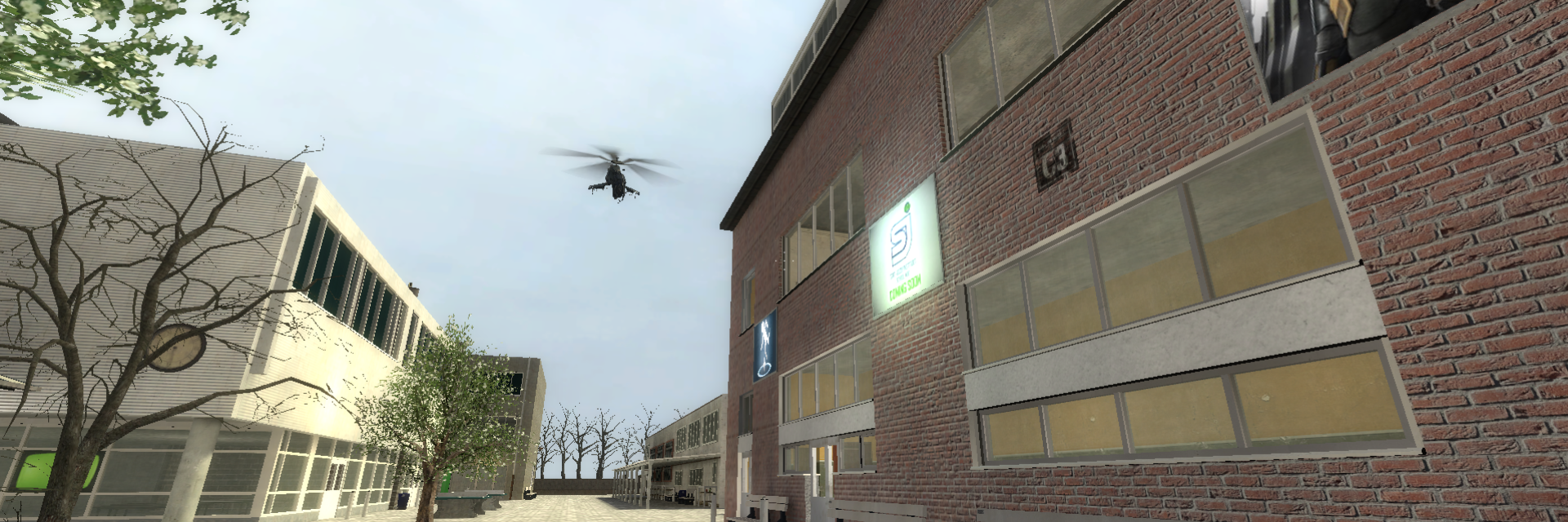 Sint-JozefInstituut gebouw met een muur met ramen en een helicopter